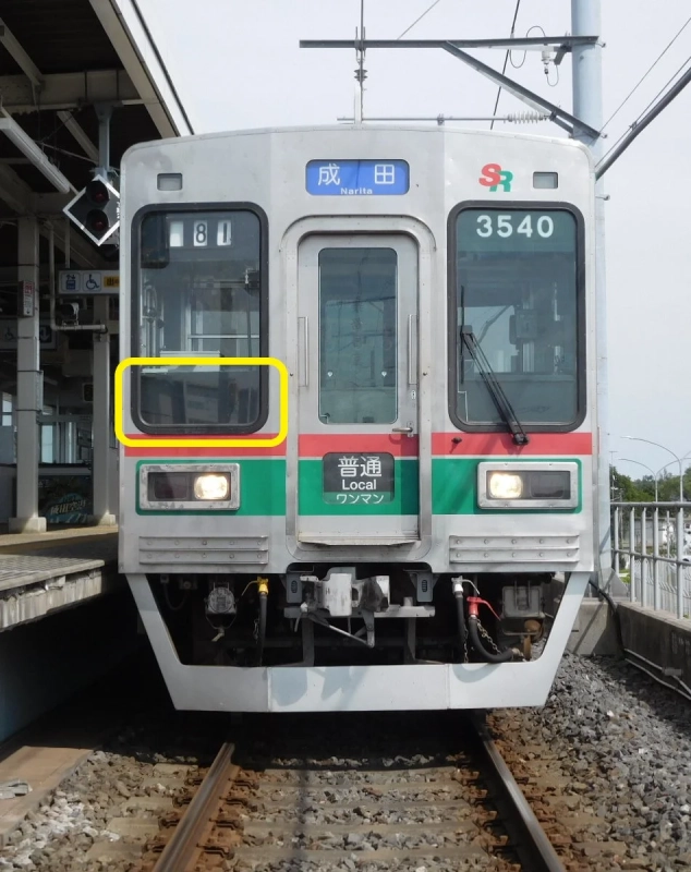 引退記念ヘッドマークを付けた芝鉄3500形