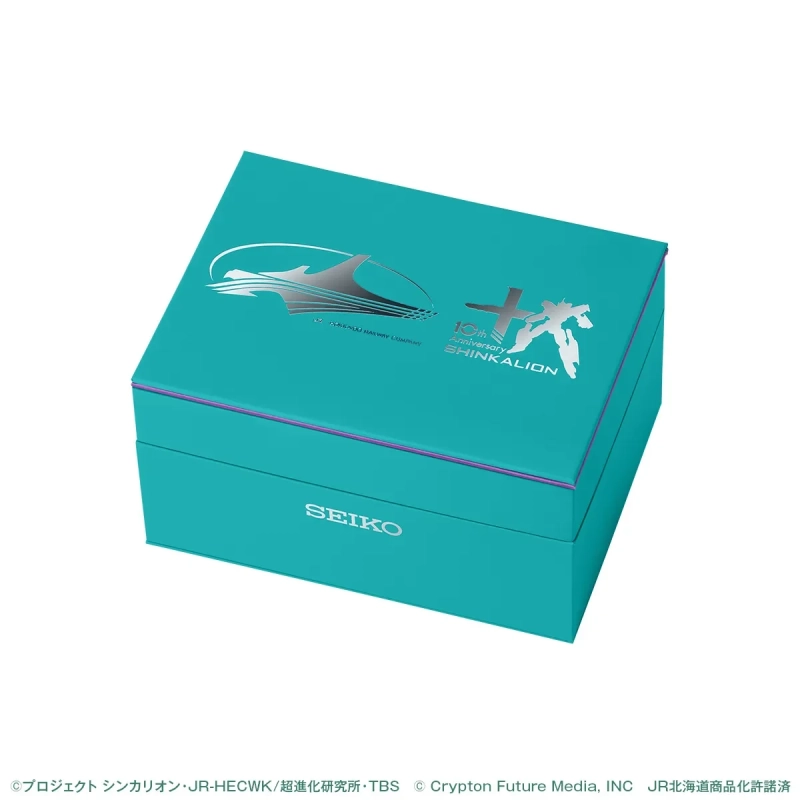 青緑色のギフトボックスで、SEIKOのロゴと「シンカリオン 10th Anniversary」の記念ロゴが銀色でデザインされています。