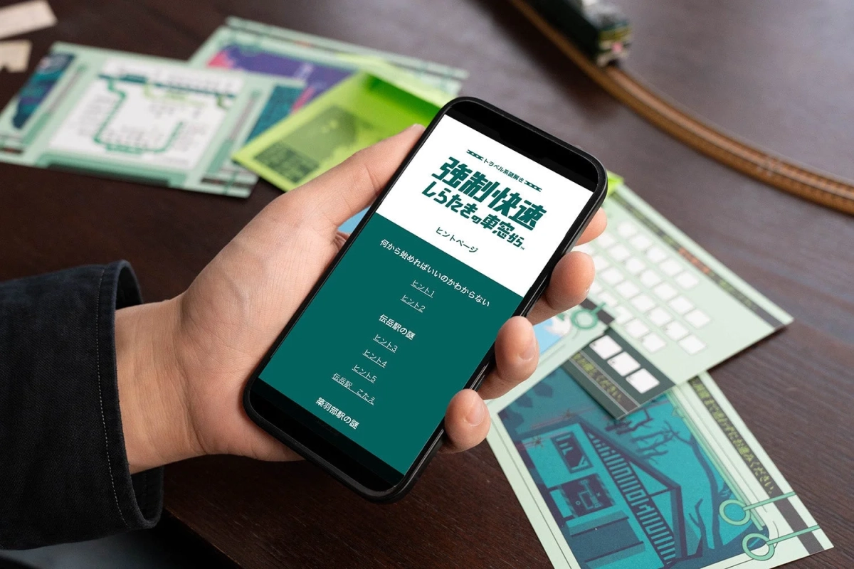 スマートフォンでヒントページを見る様子