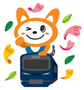 青い電車に乗った、オレンジ色の可愛らしいキャラクターがウインクしているイラスト