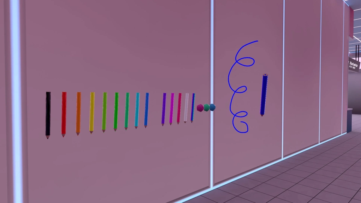 色鉛筆や落書きが描かれたモダンな空間。JR線の乗り換えゲートの表示